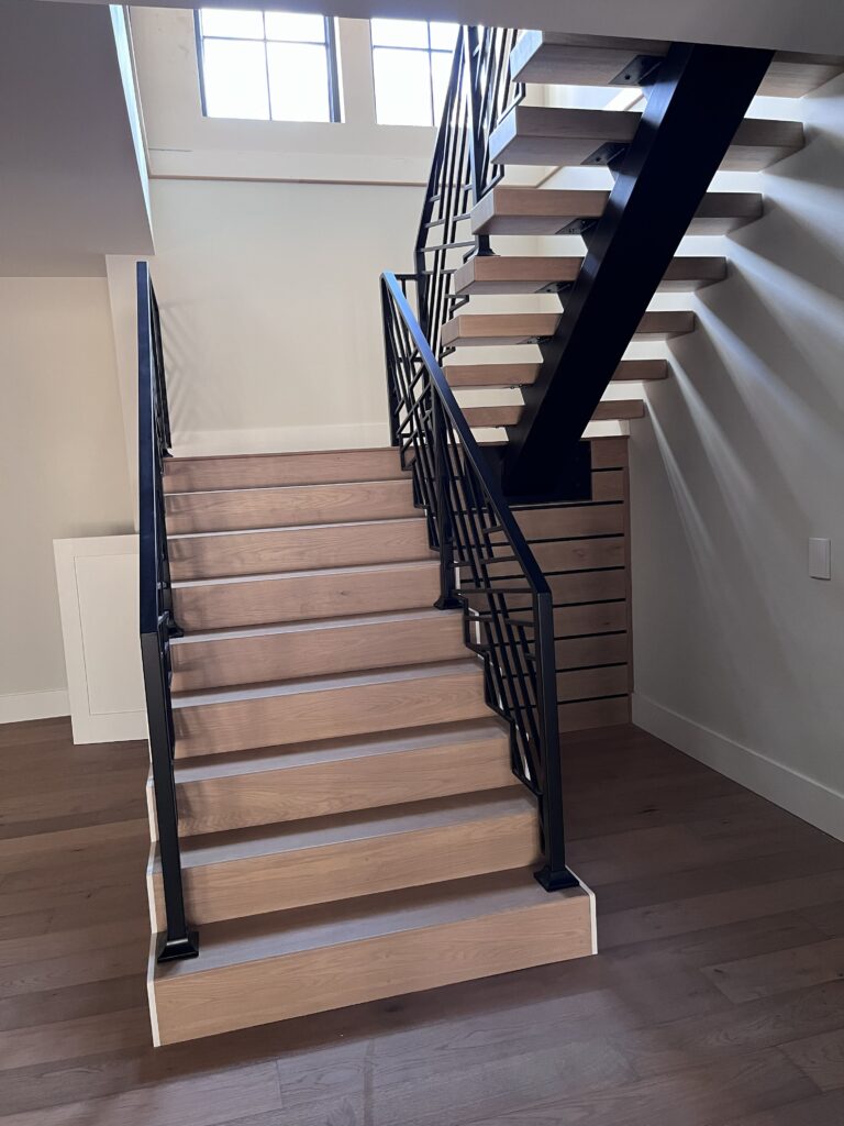 White Oak Waterfall Stair Treads by Tideline Cabinetry