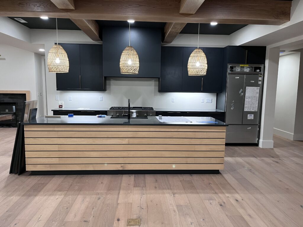 Kitchen Contemporary iron ore with latte overlayed maple island by Tideline Cabinetry